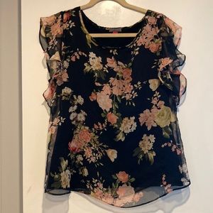 Beautiful Vince Camaro Black Print top in a size small.Excellent condition